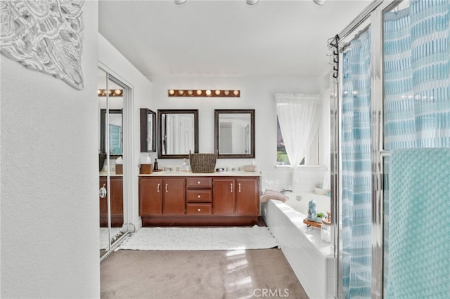 bathroom with plus walk in shower and vanity