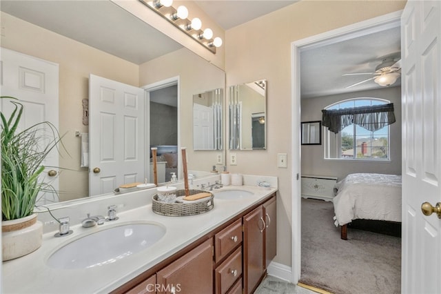 bathroom featuring ceiling fan and vanity
