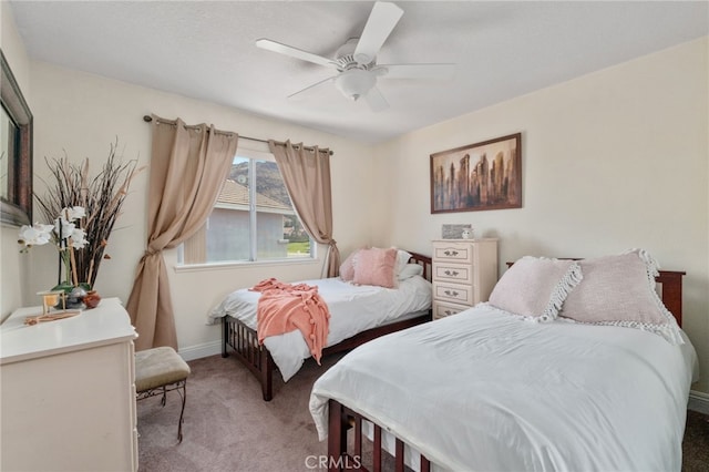 bedroom with light carpet and ceiling fan
