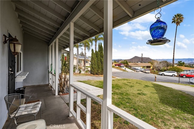 view of patio / terrace featuring a mountain view