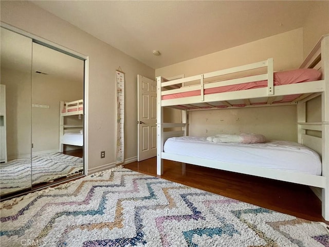 unfurnished bedroom featuring wood-type flooring