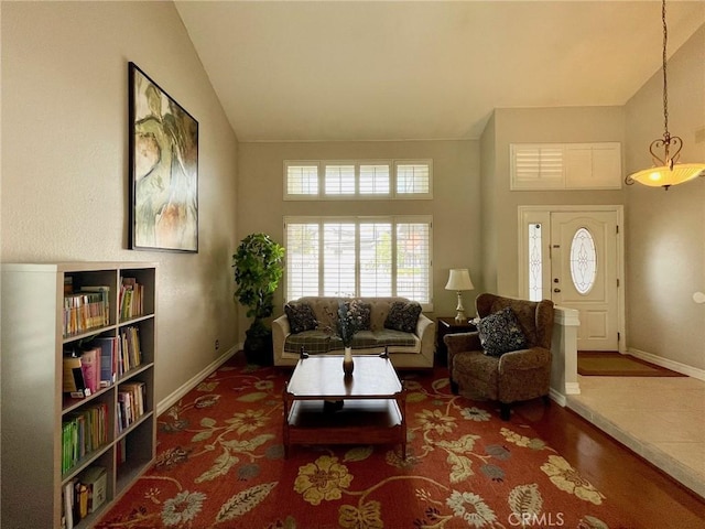 living room featuring vaulted ceiling