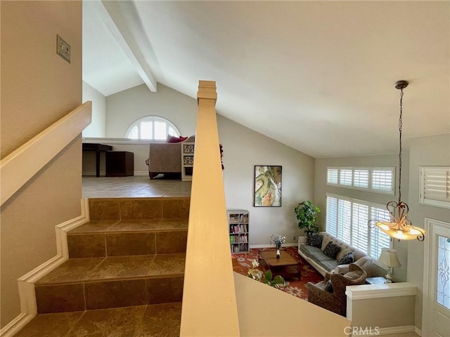 stairs featuring lofted ceiling with beams and tile patterned flooring