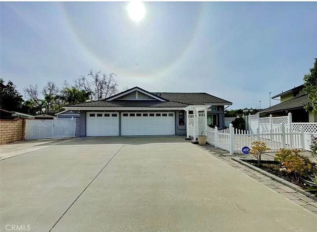 view of front of property featuring a garage