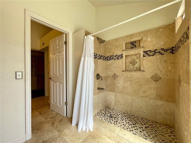 bathroom with a shower with shower curtain