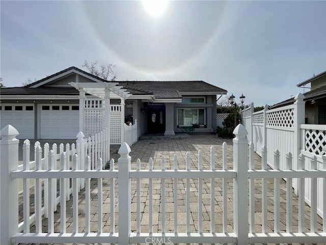 view of front of property featuring a garage