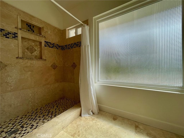 bathroom featuring curtained shower