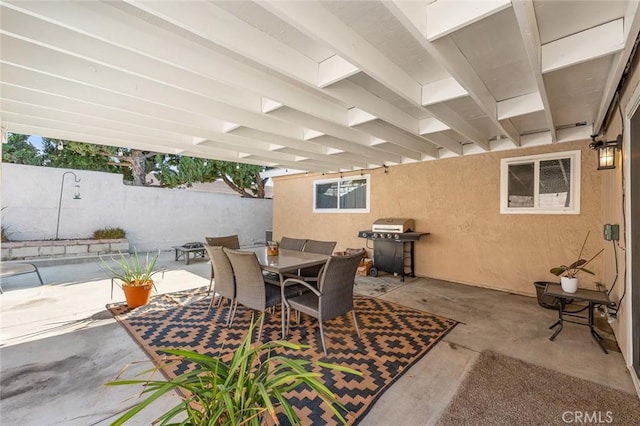 view of patio with a grill