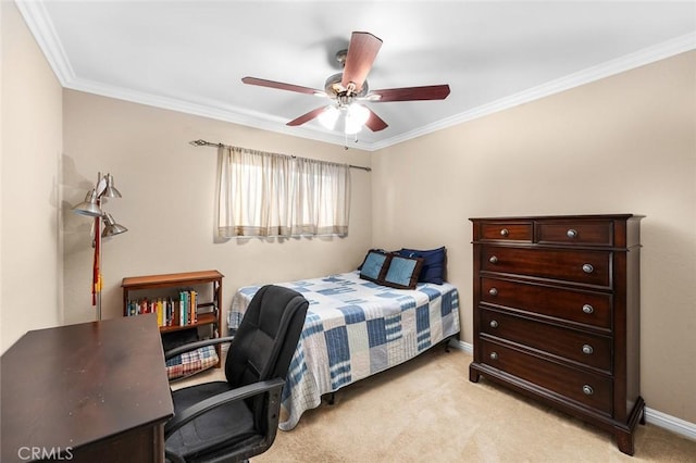 carpeted bedroom with ceiling fan and ornamental molding