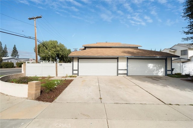 view of front of home with a garage