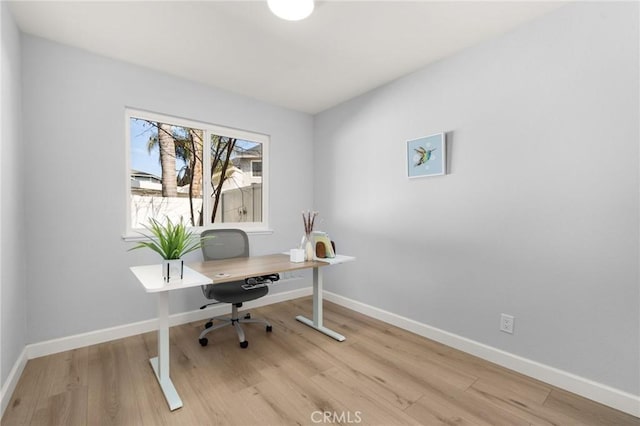 home office featuring light wood-type flooring