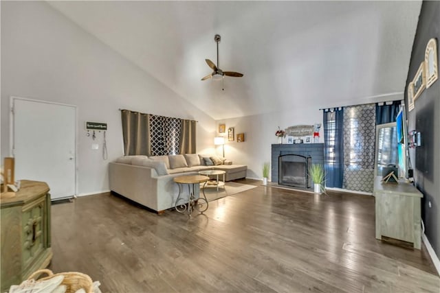 44536 Benald St, Lancaster, CA 93535 - living room with ceiling fan, high vaulted ceiling, a brick fireplace, and hardwood / wood-style floors