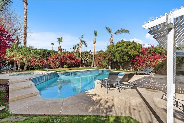 view of swimming pool featuring a pergola and a patio area