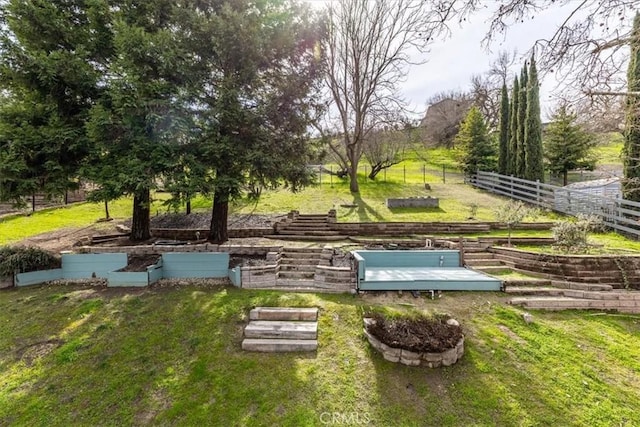 view of storm shelter with a lawn