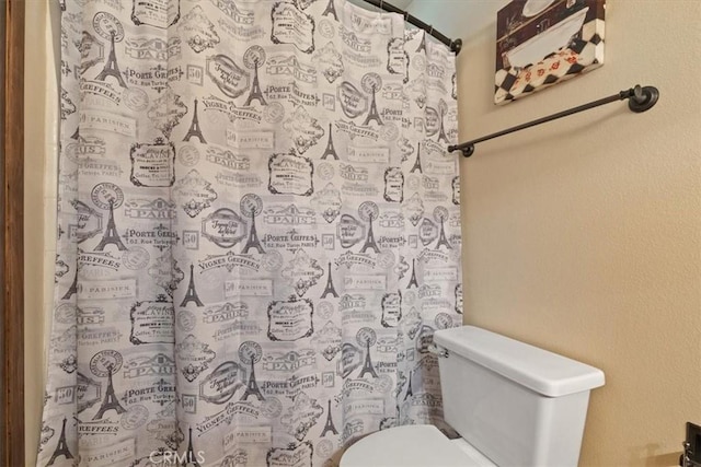 616 Jackson Dr, Paso Robles, CA 93446 - full bath featuring a shower with shower curtain and a textured wall