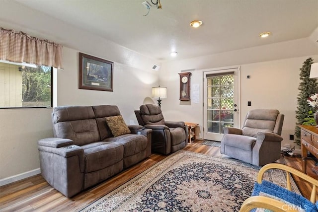 616 Jackson Dr, Paso Robles, CA 93446 - living area featuring wood finished floors, vaulted ceiling, and recessed lighting