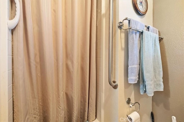 616 Jackson Dr, Paso Robles, CA 93446 - full bathroom with a shower with shower curtain and a textured wall