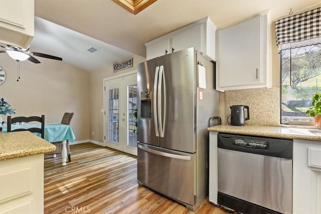 616 Jackson Dr, Paso Robles, CA 93446 - kitchen featuring stainless steel appliances, tasteful backsplash, light wood finished floors, a ceiling fan, and lofted ceiling
