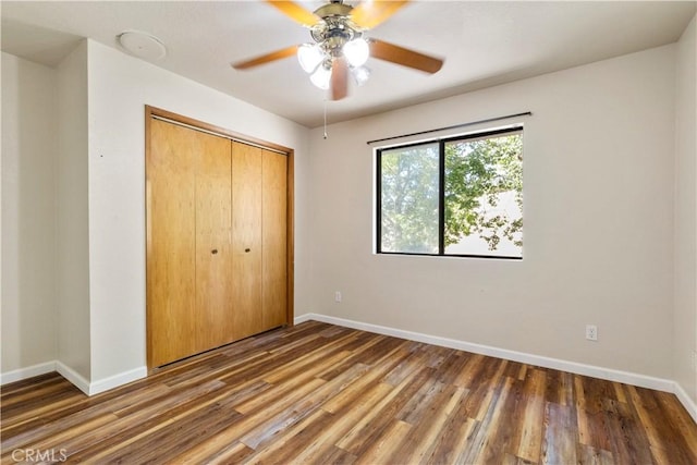 616 Jackson Dr, Paso Robles, CA 93446 - unfurnished bedroom featuring wood finished floors, a closet, and a ceiling fan