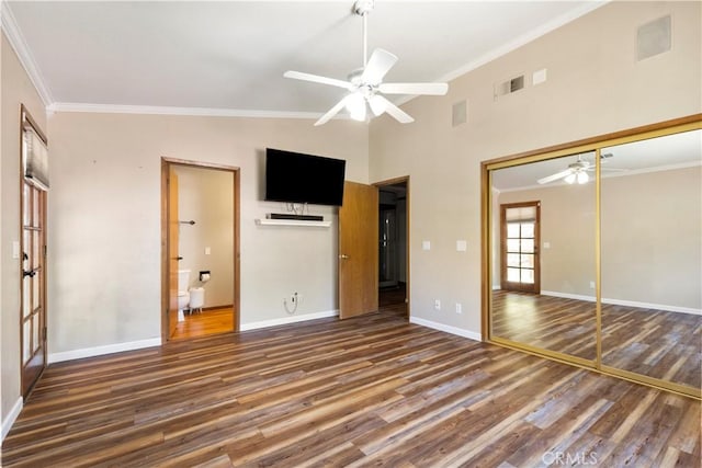 616 Jackson Dr, Paso Robles, CA 93446 - unfurnished bedroom featuring wood finished floors, ornamental molding, a closet, ceiling fan, and a towering ceiling