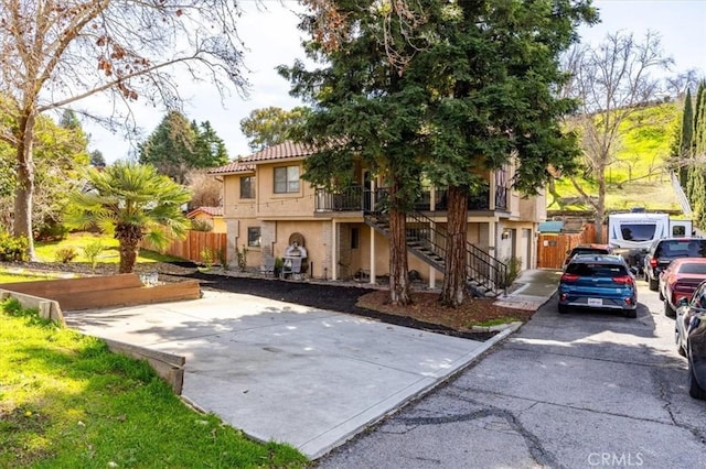 616 Jackson Dr, Paso Robles, CA 93446 - multi unit property featuring stairs, stucco siding, driveway, and a tile roof