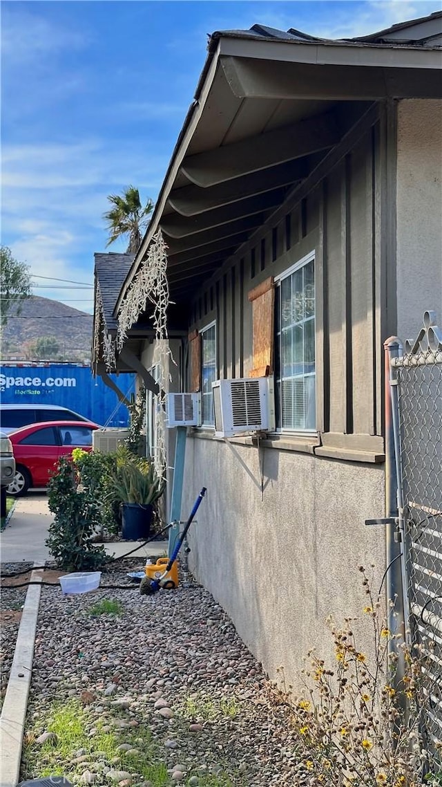 view of property exterior with cooling unit