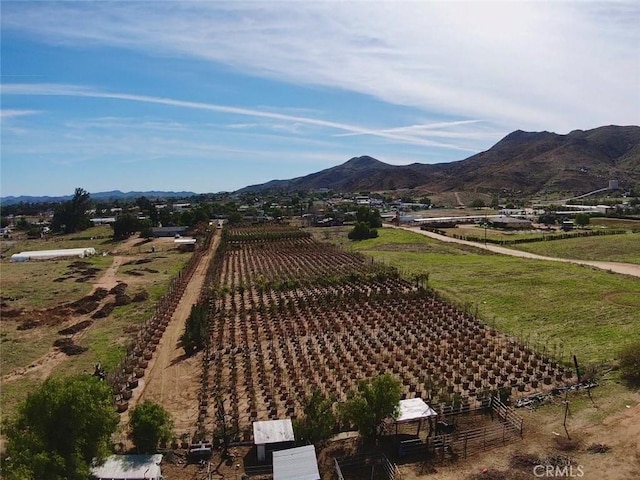 exterior space with a mountain view and a rural view