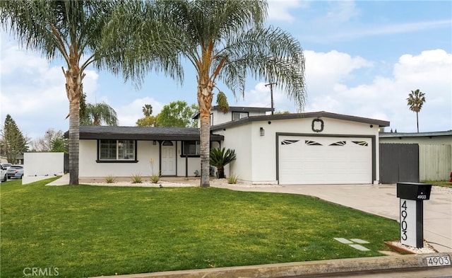 single story home featuring a front lawn and a garage