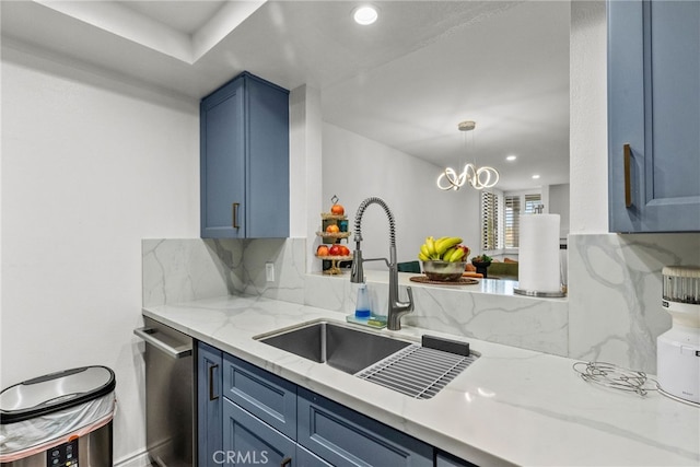 7826 Topanga Canyon Blvd Unit 101, Canoga Park, CA 91304 - kitchen featuring a sink, blue cabinetry, decorative backsplash, and dishwasher