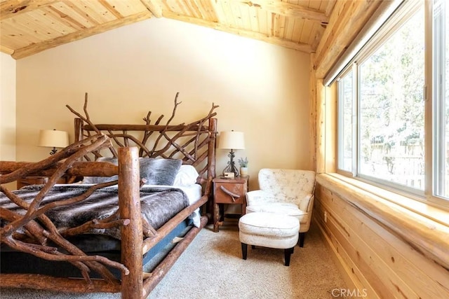 bedroom with vaulted ceiling with beams, wood ceiling, and carpet flooring