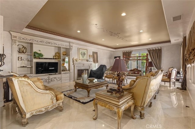 interior space featuring a tray ceiling and ornamental molding