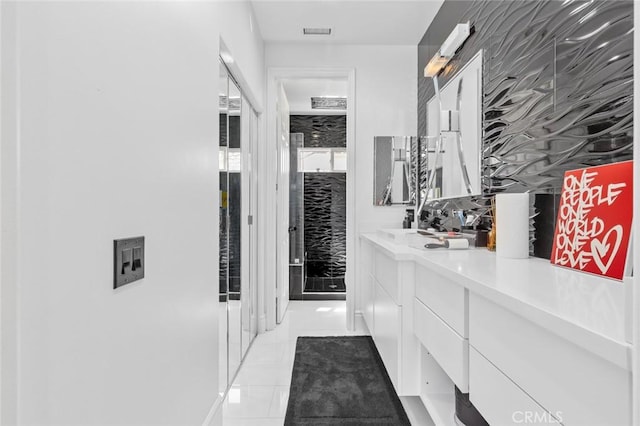 corridor with light tile patterned flooring