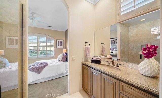 3 Mesquite Ridge Ln, Rancho Mirage, CA 92270 - ensuite bathroom with vanity, ornamental molding, and ensuite bath