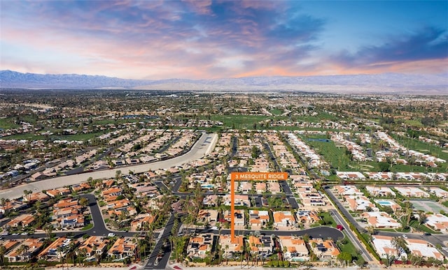 3 Mesquite Ridge Ln, Rancho Mirage, CA 92270 - aerial view at dusk of a mountain view and a residential view