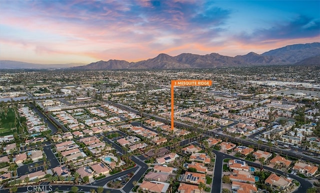 aerial view at dusk with a mountain view