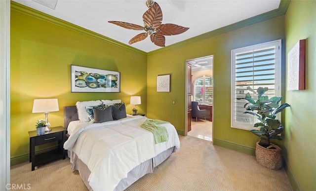 bedroom with light carpet, ornamental molding, and baseboards