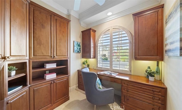 office featuring ceiling fan, crown molding, and built in study area