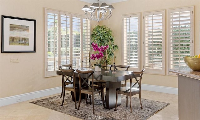 3 Mesquite Ridge Ln, Rancho Mirage, CA 92270 - dining area featuring a chandelier and tile patterned flooring