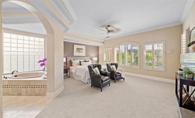 bedroom with baseboards, arched walkways, carpet flooring, and ornamental molding