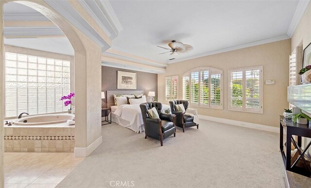 3 Mesquite Ridge Ln, Rancho Mirage, CA 92270 - carpeted bedroom featuring ornamental molding, arched walkways, and tile patterned flooring