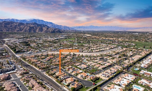 3 Mesquite Ridge Ln, Rancho Mirage, CA 92270 - aerial view at dusk of a mountain view and a residential view