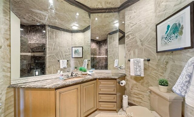 3 Mesquite Ridge Ln, Rancho Mirage, CA 92270 - full bath with a tile shower, vanity, and tile walls