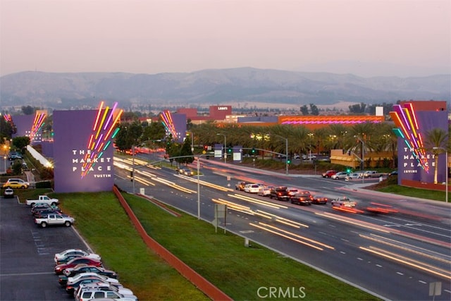 exterior space featuring a mountain view