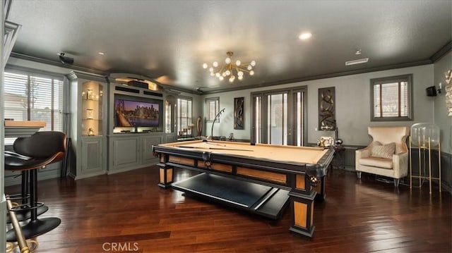 game room featuring ornamental molding, dark wood-type flooring, and billiards