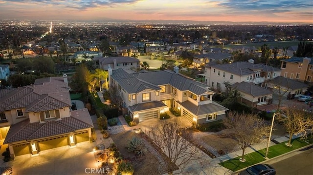 aerial view at dusk with a residential view