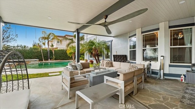 view of patio with ceiling fan, an outdoor pool, and an outdoor living space with a fire pit