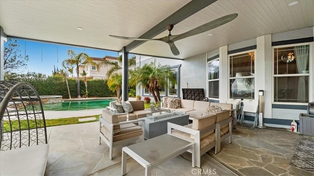 view of patio / terrace with ceiling fan, an outdoor living space with a fire pit, and an outdoor pool