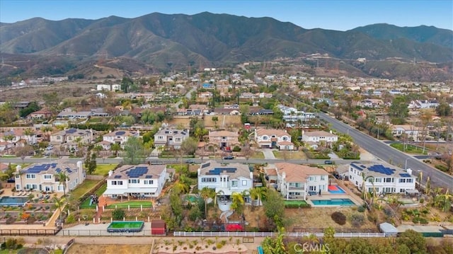 bird's eye view with a residential view and a mountain view