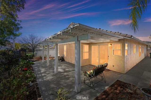 view of patio featuring a fenced backyard and a pergola