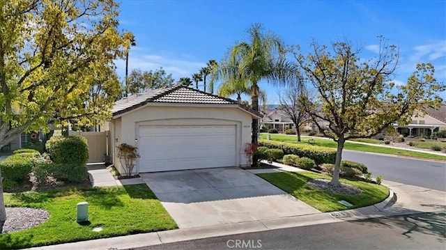 garage featuring driveway